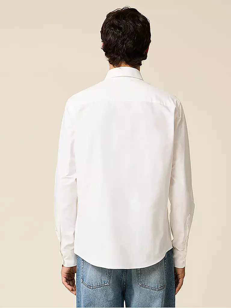AMI PARIS | Camisa
Marca: AMI PARIS
Farbe: weiss
Categorías: Moda,Herren

Largo de la manga: Manga larga
Material: Algodón
Forma del cuello: Cuello abotonado
Diseño: Liso
Corte (Prenda superior): Regular
Estilo: Tendencia
Detalles: Logo | Blanco