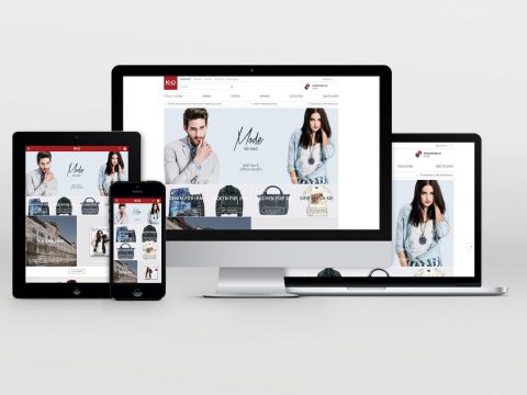 Ein responsives Webdesign, das auf mehreren Geräten angezeigt wird: Desktop-Computer, Laptop, Tablet und Smartphone. Die Site präsentiert eine Modemarke mit Bildern von Models und einer Handtaschenkollektion.