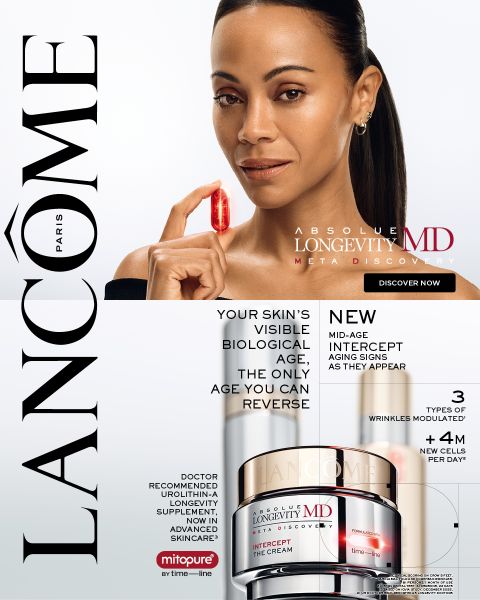 Una mujer sostiene una cápsula roja junto a su rostro, junto a productos de cuidado de la piel de Lancôme y un texto que promociona "Absolue Longevity MD" y destaca su efecto antienvejecimiento.