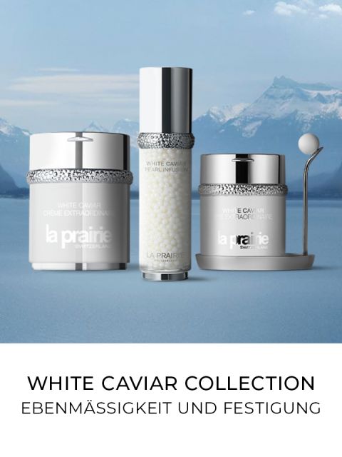 Presentación de tres productos para el cuidado de la piel La Prairie de la colección White Caviar frente a un paisaje montañoso con un lago. Abajo, en alemán, el texto dice "UNIFORMIDAD Y FIRMEZA".
