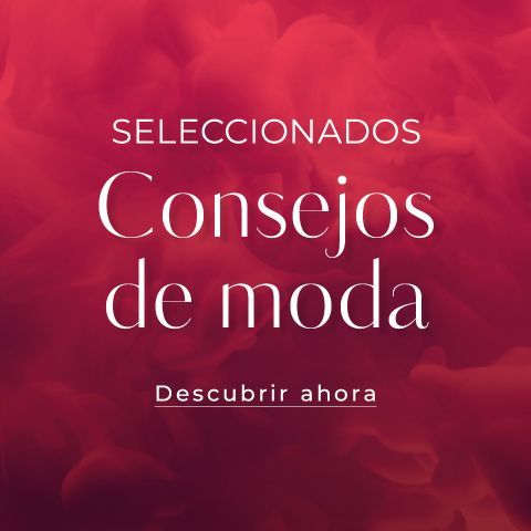 Texto blanco que dice "Consejo de Moda" sobre un fondo borroso, abstracto, negro y gris.