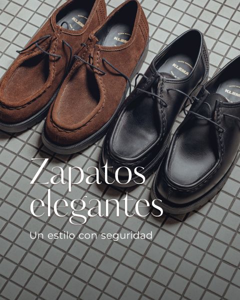 Dos pares de zapatos de vestir, uno de ante marrón y otro de cuero negro, están sobre un suelo de baldosas. El texto dice: "Zapatos elegantes. Un estilo con seguridad."