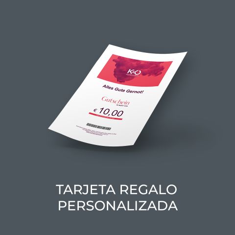 Se muestra una tarjeta regalo personalizada en alemán y español por valor de 10 € sobre un fondo gris oscuro, debajo pone "TARJETA REGALO PERSONALIZADA".