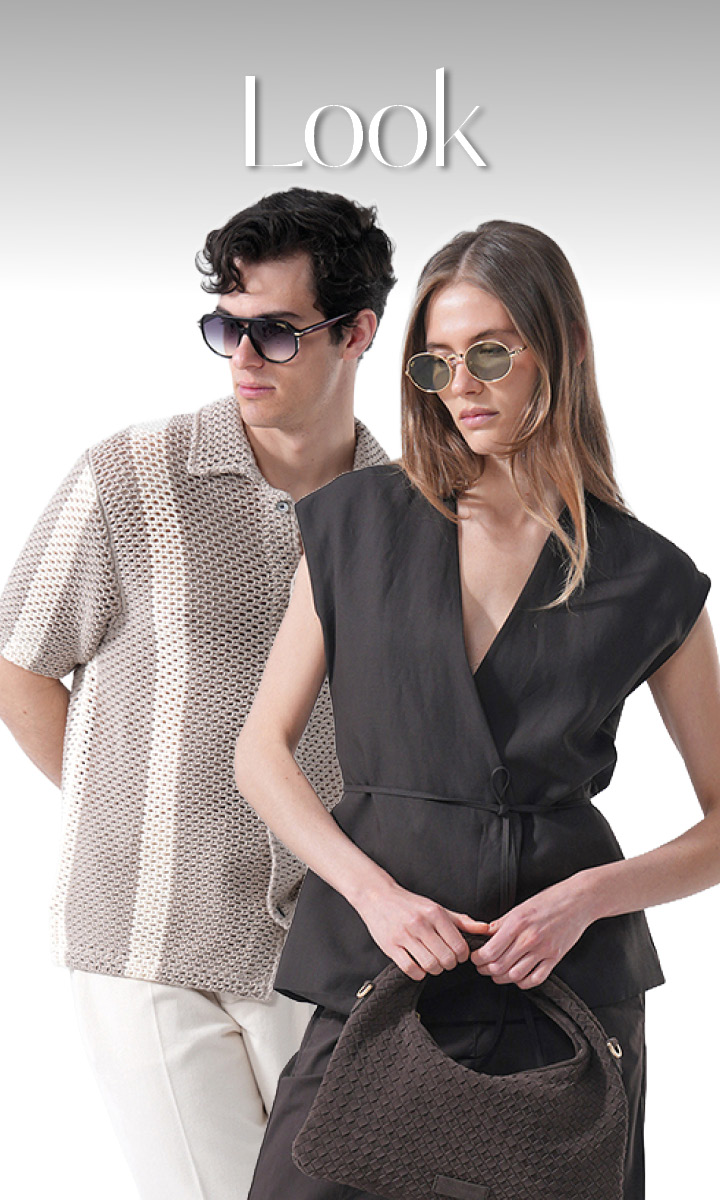 Dos modelos elegantes con gafas de sol y atuendos modernos de colores neutros posan con confianza frente a un fondo blanco degradado y la palabra "Look" sobre ellos.