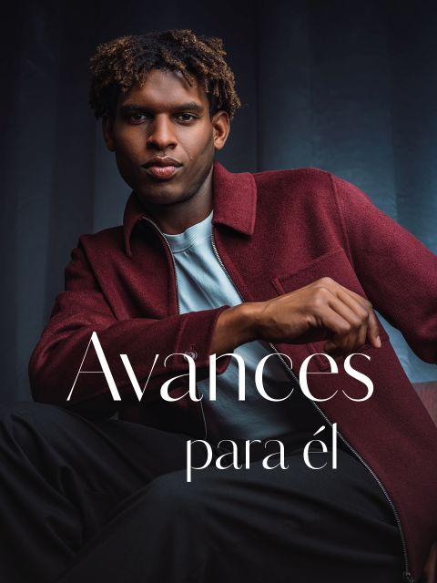 Un hombre con una chaqueta burdeos y una camisa gris posa con confianza. El texto dice: «Avances para él.»