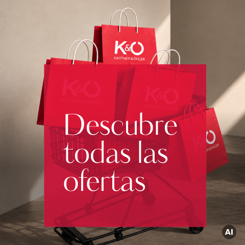 Bolsas de la compra rojas en un carrito de la compra con el logotipo de "Kastner & Öhler", superpuestas con texto en español: "Descubre todas las ofertas.".