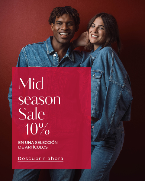 Dos personas con atuendos de mezclilla se sonríen. El texto superpuesto dice: Rebajas de mitad de temporada: 10 % de descuento en artículos seleccionados. Descúbrelo ahora.