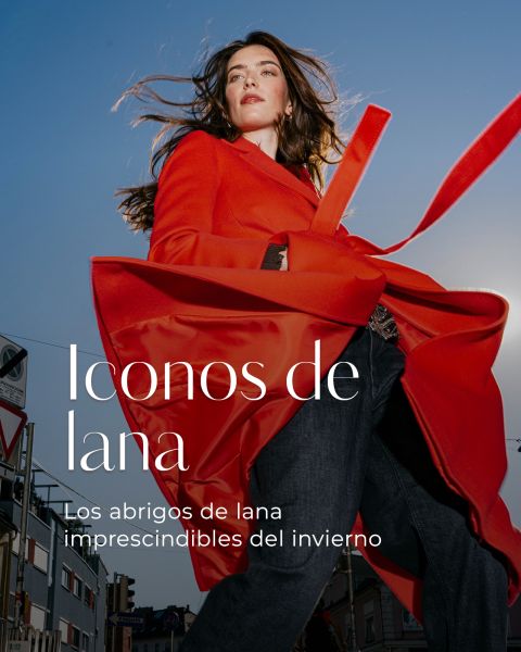 Una mujer con un abrigo rojo brillante, superpuesto con un texto en español que dice: "Iconos de lana. Los abrigos de lana imprescindibles para el invierno."