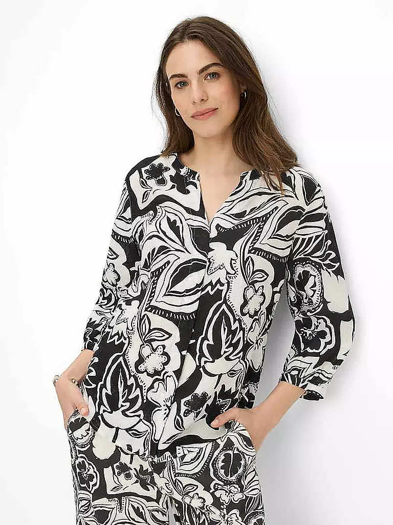 BRAX | Blusa de lino VELIA
Marca: BRAX
Color: negro
Categorías: Moda, Mujer
Etiquetas: Tallas grandes

Largo de manga: Manga 3/4
Escote: Escote túnica
Material: Lino
Estampado: Estampado
Corte (Prenda exterior): Regular
Estilo: Casual
Detalles: Fruncido | Negro