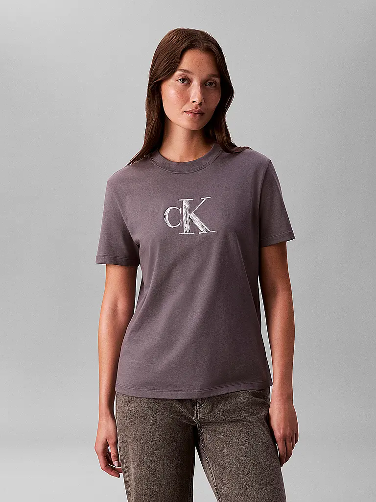 CALVIN KLEIN JEANS | Nombre del producto: Camiseta
Marca: CALVIN KLEIN JEANS
Color: gris
Categorías: Moda,Mujer

Largo de manga: Manga corta
Escote: Cuello redondo
Material: Jersey,Algodón
Diseño: Logo
Corte (Prenda superior): Regular
Estilo: Moda joven
Detalles: Lentejuel | 