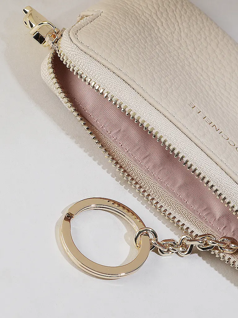 COCCINELLE | Nombre del producto: Funda para llaves C-ME SOFTY | Crema