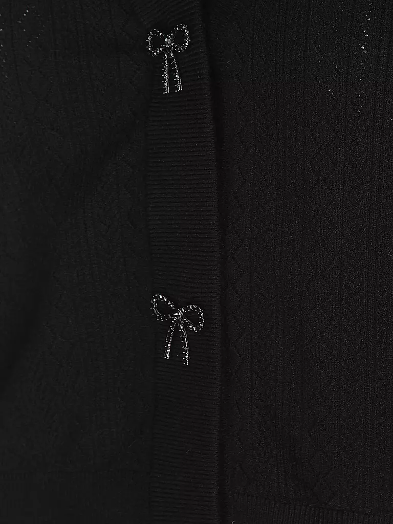 GUESS | Cárdigan
Marca: GUESS
Color: negro
Categorías: Moda,Mujer
Largo de manga: Manga larga
Escote: Cuello en V
Material: Viscosa, poliéster / poliamida
Diseño: Color liso
Corte (Prenda exterior): Regular
Estilo: Young Fashion, Glamour
Detalles: Patrón de |