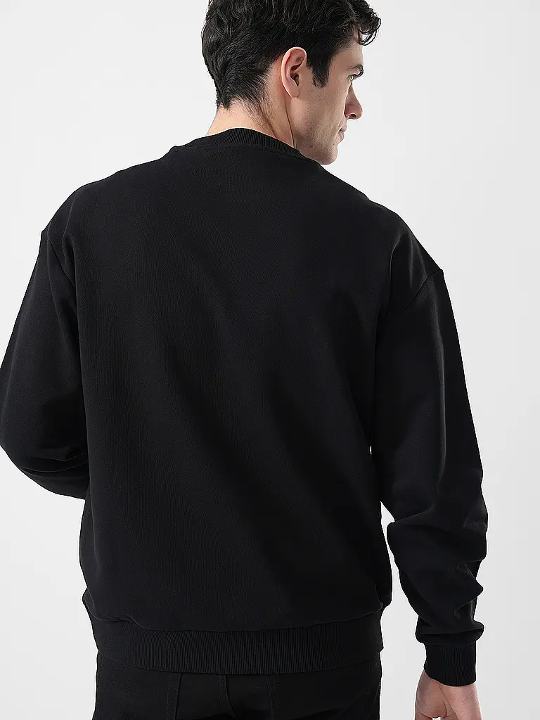 HUGO | Nombre del producto: Sweater DANOTOP
Marca: HUGO
Color: negro
Categorías: Moda, Hombre

Largo de manga: Manga larga
Escote: Cuello redondo
Material: Felpa, Algodón
Diseño: Logo
Corte (Prendas superiores): Suelto
Estilo: Puro, Tendencia | Negro