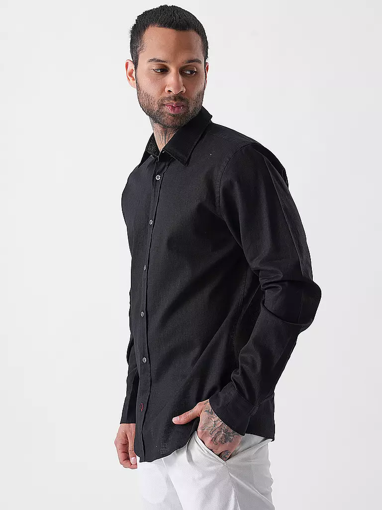 JOOP | Camisa Slim Fit HANSON
Marca: JOOP
Color: negro
Categorías: Moda, Hombre

Largo de manga: Manga larga
Material: Lino, Algodón
Forma del cuello: Cuello Kent
Diseño: Liso
Corte (Prenda superior): Slim
Estilo: Smart Business
Detalles: Jaspeado | Negro