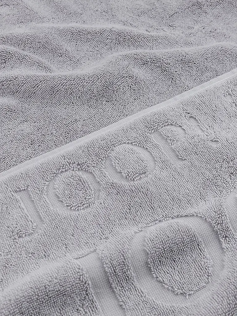 JOOP | Toalla 50x100cm STUDIO REPEAT Platino | Gris claro