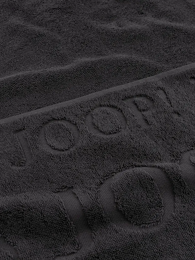 JOOP | Toalla de tocador 30x50cm STUDIO REPEAT Basalto | Negro