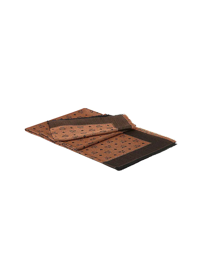 MCM | Nombre del producto: Bufanda
Marca: MCM
Color: marrón
Categorías: Moda, Mujer

Material: Lana
Estampado: Estampado, Logo
Estilo: Tendencia
Detalles: Flecos | Marrón