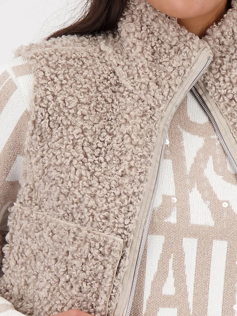 MONARI | Chaleco reversible con aspecto de piel | 