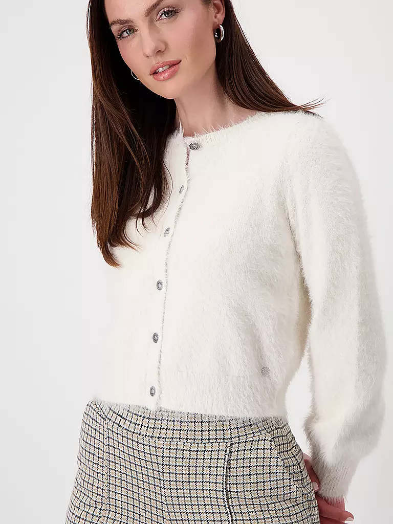 MONARI | Nombre del producto: Chaqueta
Marca: MONARI
Color: crema
Categorías: Moda, Mujer
Etiquetas: Tallas grandes

Longitud de la manga: Manga larga
Escote: Cuello redondo
Material: Poliacrílico / Acrílico, Punto
Estampado: Liso
Estilo: Glamour | Crema