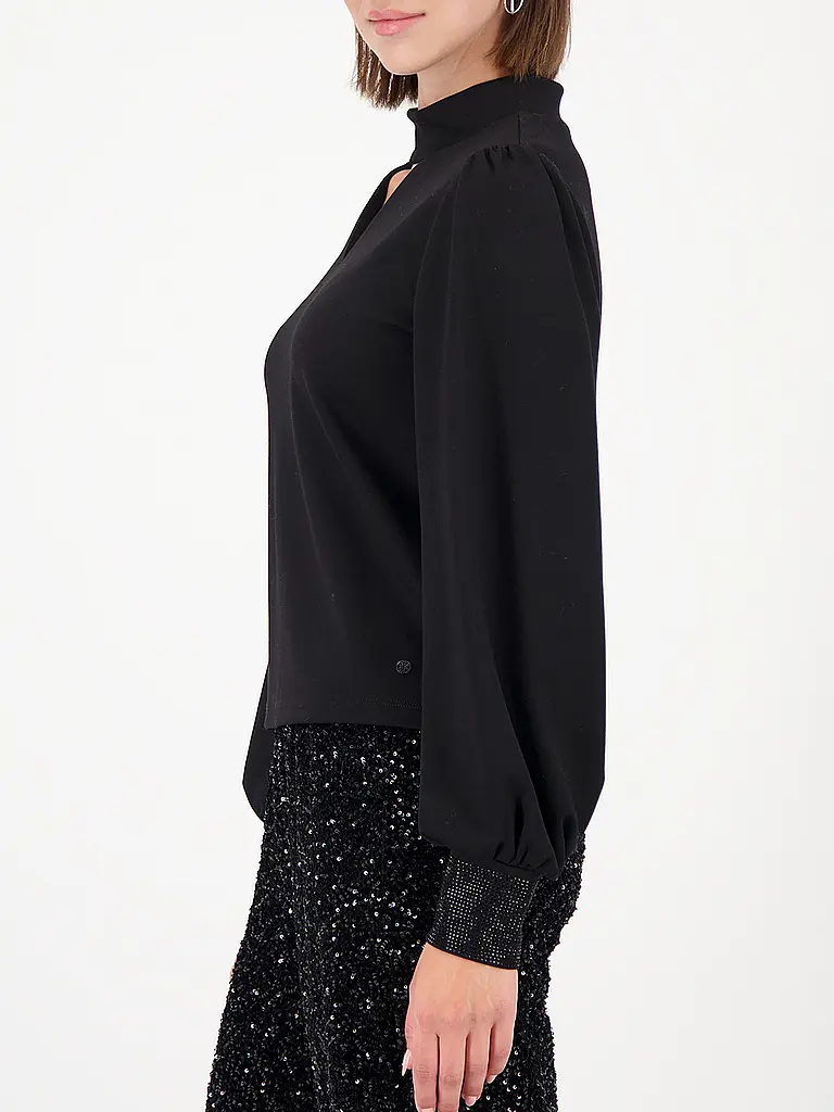 MONARI | Produktname: Camiseta de manga larga
Marke: MONARI
Farbe: negro
Kategorien: Moda, Mujer
Ärmellänge: Manga larga
Material: Jersey, Poliéster / Poliamida, Viscosa, Elástico
Kragenform: Cuello alto
Musterung: Liso
Passform (Oberbekleidung): Regular
Stil |