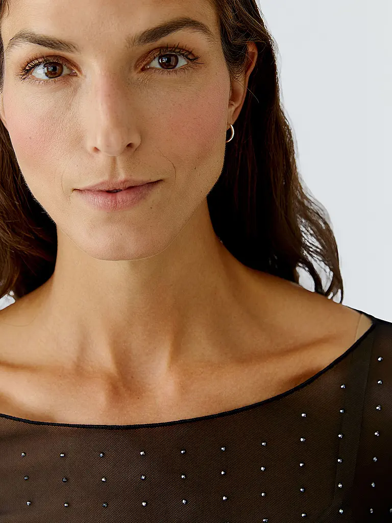 OUÍ | Nombre del producto: Camiseta de manga larga
Marca: OUÍ
Color: negro
Categorías: Moda, Mujer

Largo de manga: Manga larga
Escote: Cuello barco
Material: Jersey, Poliéster / Poliamida, Elástico
Diseño: Liso
Corte (Prenda superior): Slim
Detalles: Estr | Negro