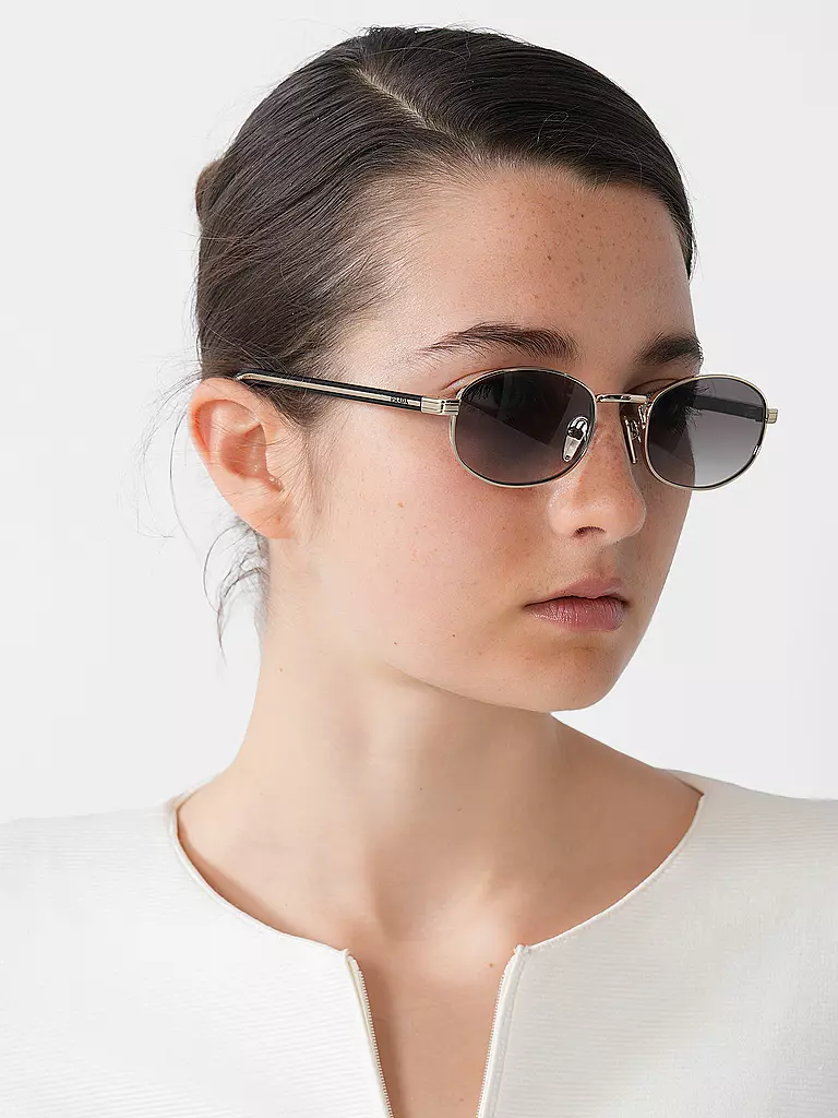 PRADA | Nombre del producto: Gafas de sol
Marca: PRADA
Color: oro
Categorías: Moda, Mujer

Material: Metal | Oro