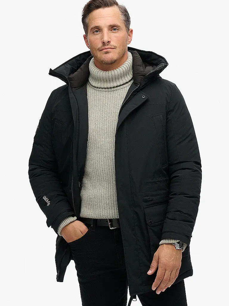 SUPERDRY | Parka CITY PADDED
Marca: SUPERDRY
Color: negro
Categorías: Moda, Hombre

Largo de manga: Manga larga
Material: Poliéster / Poliamida
Forma del cuello: Capucha
Estampado: Liso
Corte (Prenda exterior): Suelto
Detalles: Bolsillos laterales, Resistente al a | Negro