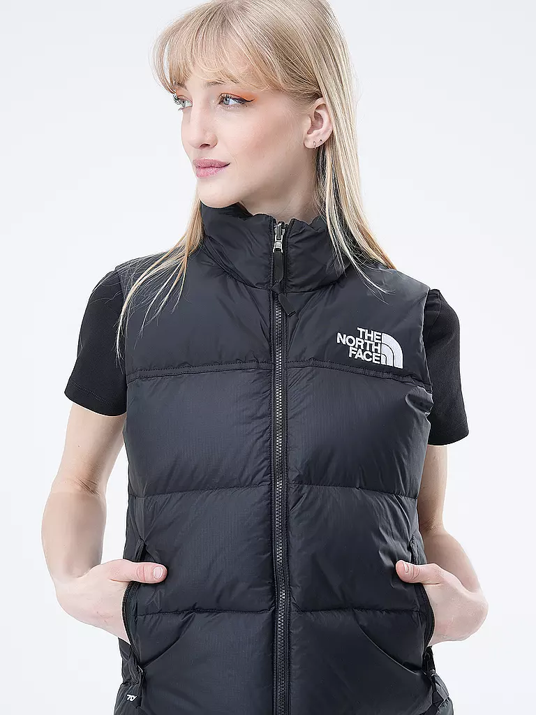 THE NORTH FACE | Chaleco acolchado de plumón
Marca: THE NORTH FACE
Color: negro
Categorías: Moda, Mujer

Largo de manga: Sin mangas
Material: Plumón, Nylon
Forma del cuello: Cuello alto, Capucha
Diseño: Liso, Logo, Estampado
Corte (Prenda exterior): Regular
Estilo: Mo | 