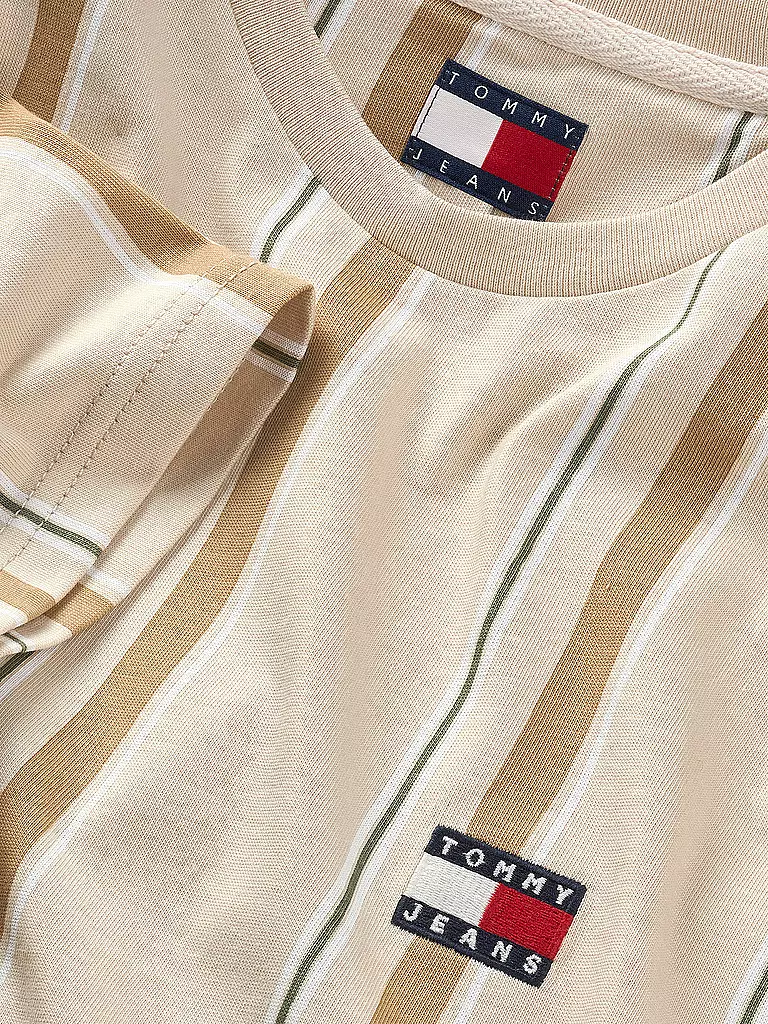 TOMMY JEANS | Nombre del producto: Camiseta
Marca: TOMMY JEANS
Color: beige
Categorías: Moda, Hombre

Largo de manga: Manga corta
Escote: Cuello redondo
Material: Jersey, Algodón
Diseño: Rayas
Corte (Prenda superior): Regular
Estilo: Moda joven
Detalles: Logo | 