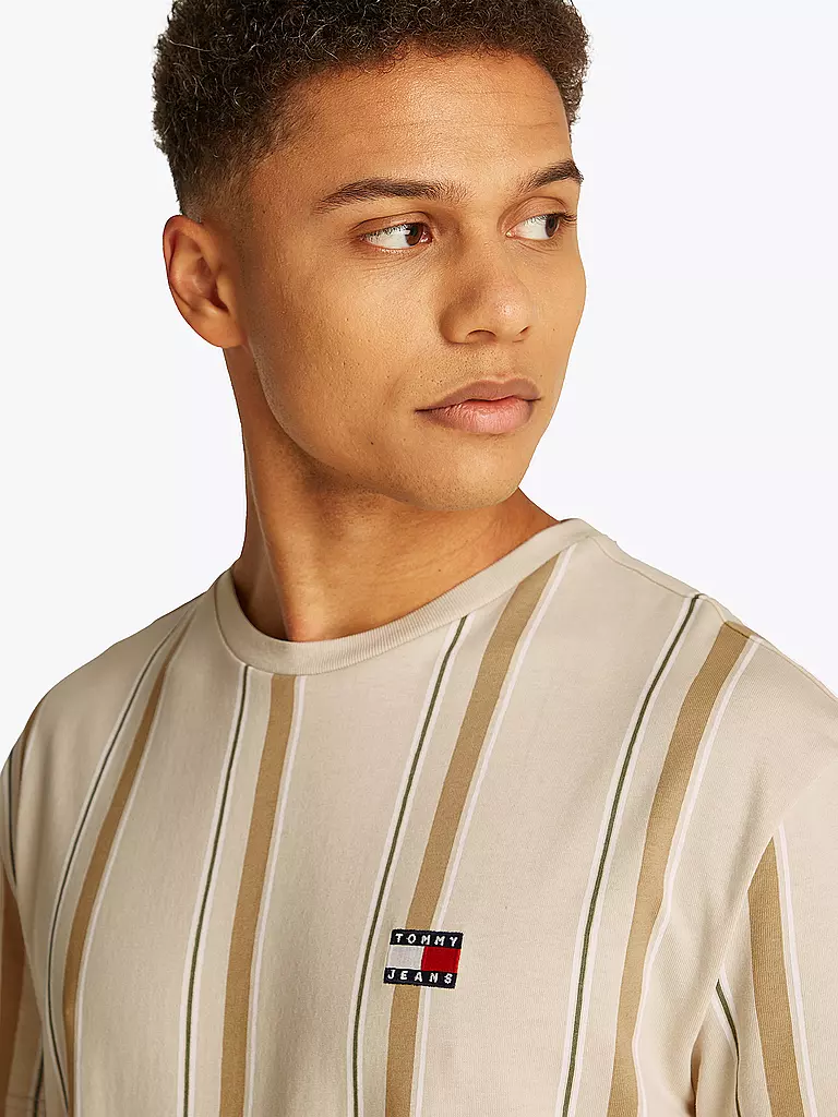 TOMMY JEANS | Nombre del producto: Camiseta
Marca: TOMMY JEANS
Color: beige
Categorías: Moda, Hombre

Largo de manga: Manga corta
Escote: Cuello redondo
Material: Jersey, Algodón
Diseño: Rayas
Corte (Prenda superior): Regular
Estilo: Moda joven
Detalles: Logo | 