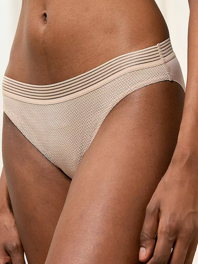 TRIUMPH | Braga Tai "Infinite Sensation" (Piel Suave) | 