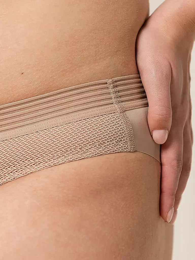 TRIUMPH | Braga Tai "Infinite Sensation" (Piel Suave) | 