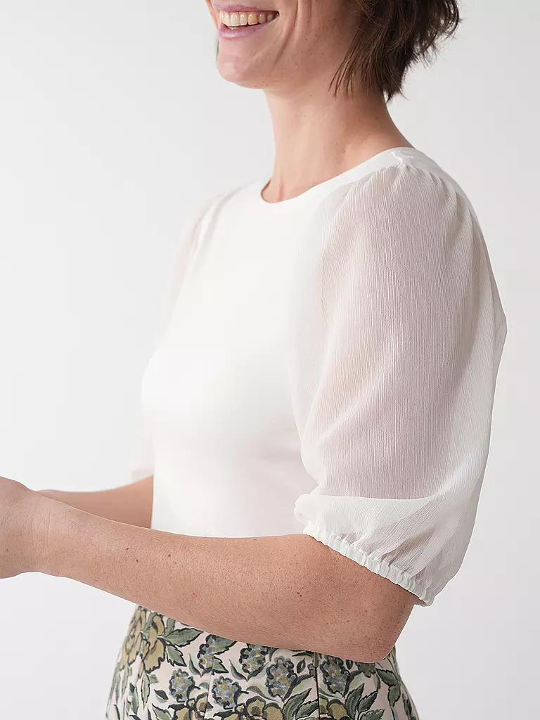 WENGER | Blusenshirt INN
Marke: WENGER
Farbe: crema
Kategorien: Mode,Damen

Ärmellänge: 3/4 Ärmel
Ausschnitt: Rundhalsausschnitt
Material: Jersey,Chiffon,Stretch,Viskose ,Mix
Musterung: Unifarben
Passform (Oberbekleidung): Regular | Crema